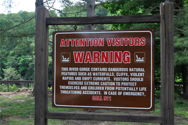 river warning sign